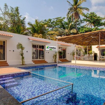 Hotel Treebo Code Red Morjim Exterior foto