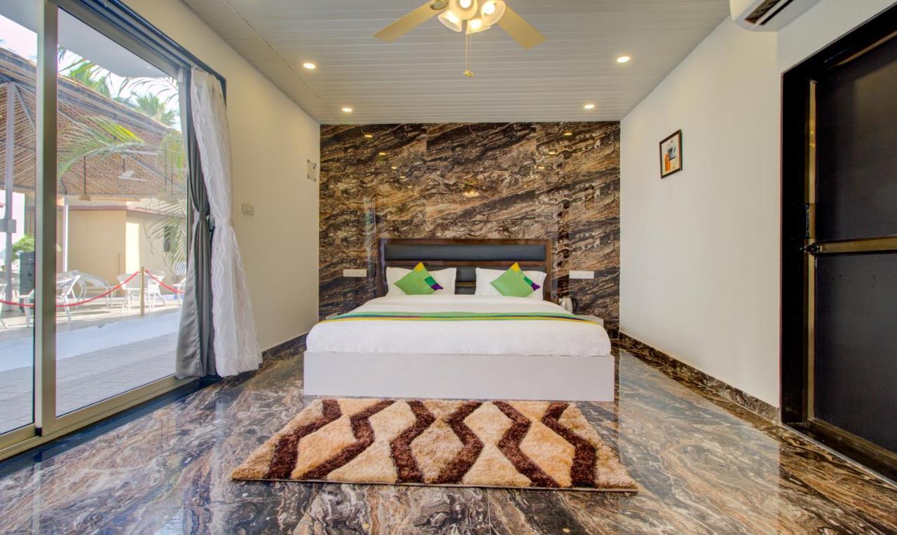 Hotel Treebo Code Red Morjim Exterior foto