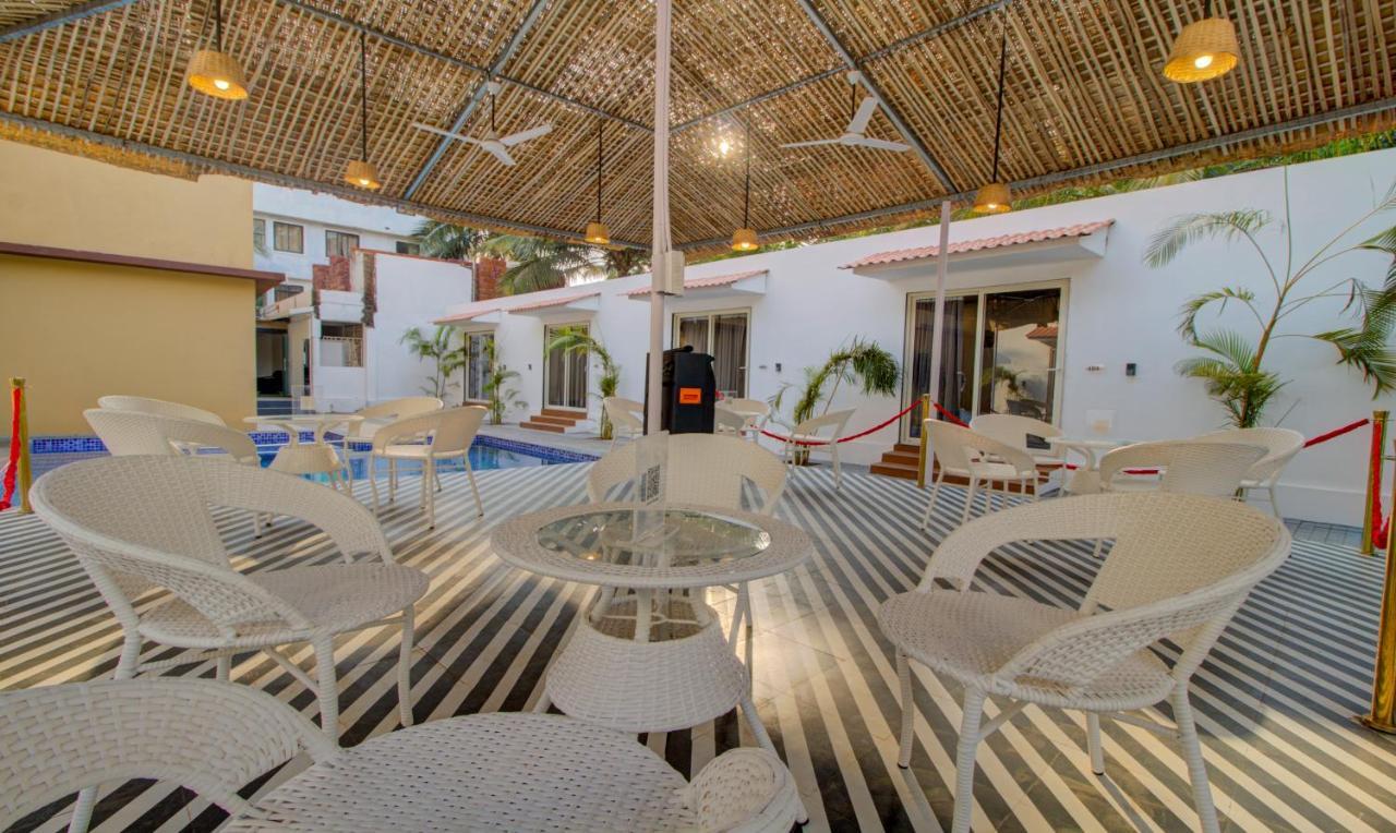 Hotel Treebo Code Red Morjim Exterior foto
